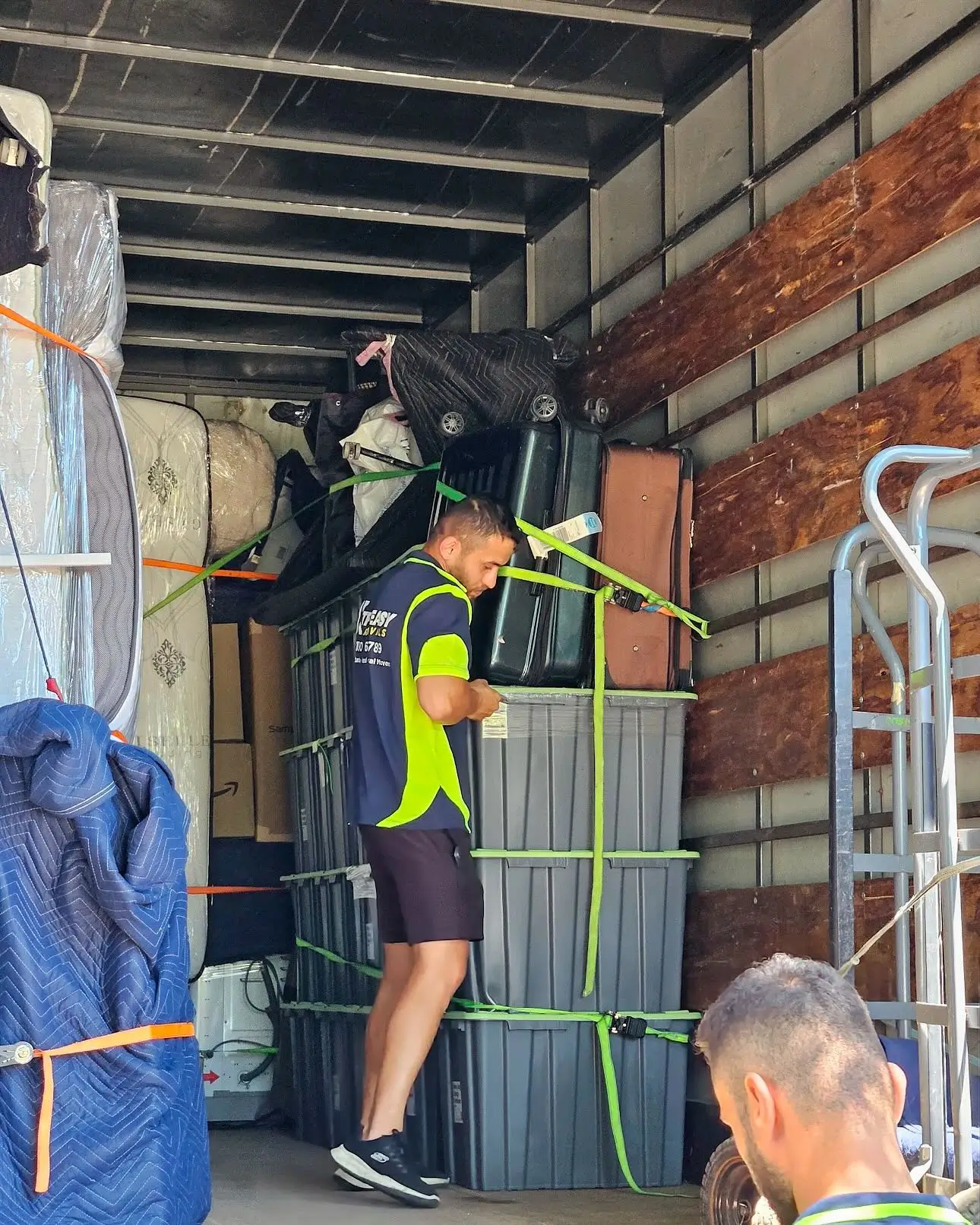 Long distance removalists Sydney backloading service truck for cost-effective interstate moves to Queensland and Western Australia