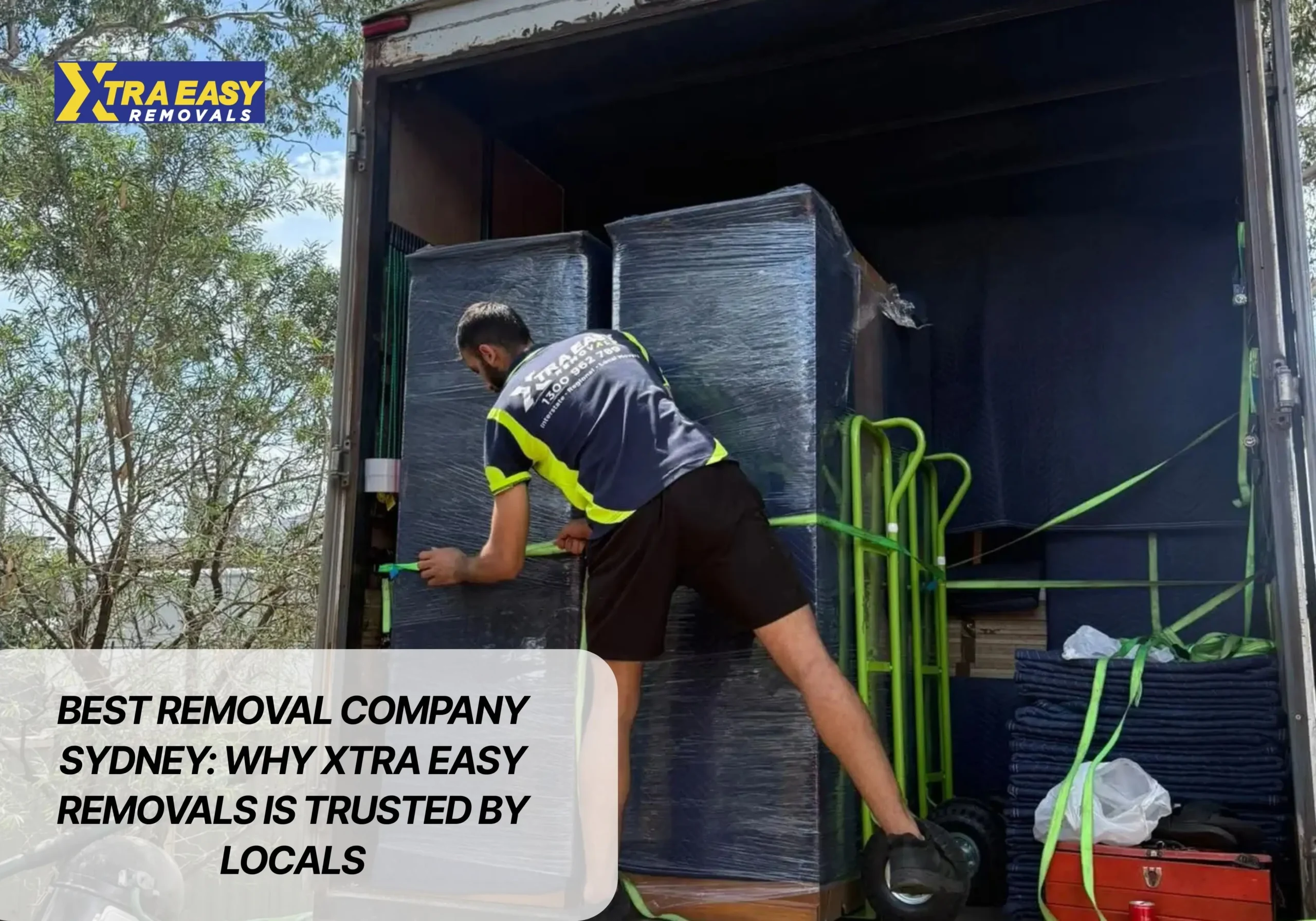 Xtra Easy removal company Sydney team carefully drop oversized cupboards from the balcony at St James Menangle Church