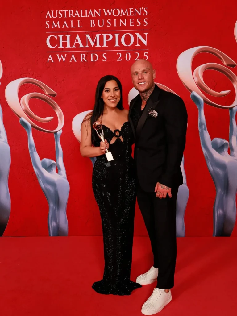 Xtra Easy Removals owner accepting award recognising excellence in office removal services Sydney and beyond