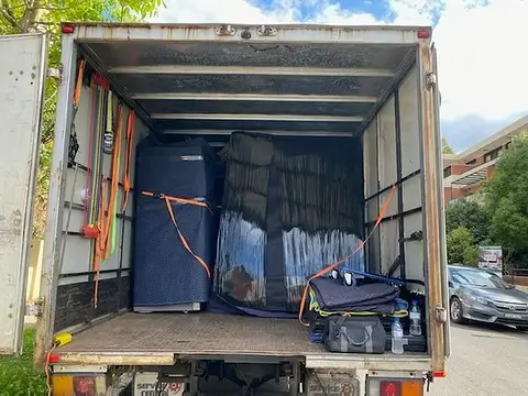Sydney to Adelaide removalists truck loaded with a client's furniture and packed boxes.